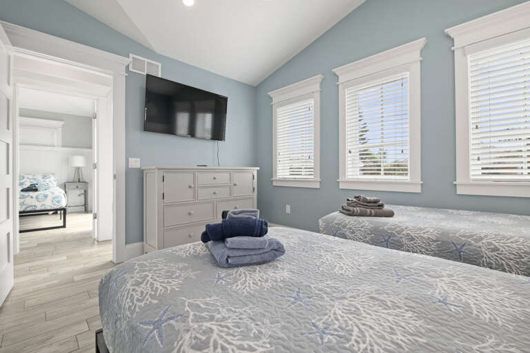 Leave the door open between this room and the next so the kids can check on each other before lights-out.