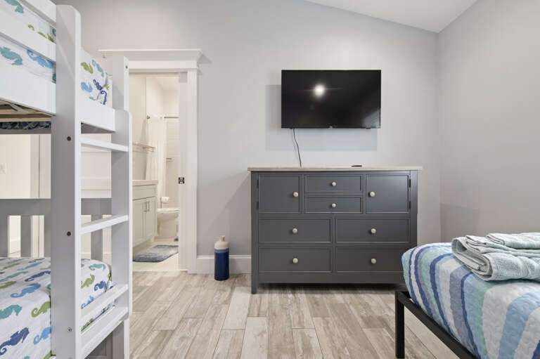 Put the kids to bed with their own TV and their own bathroom right next door — nobody's negotiating bedtime tonight.