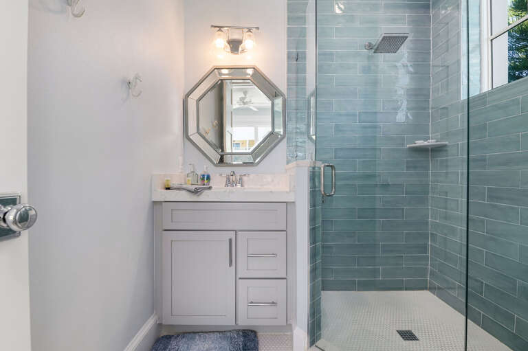 Get ready without fighting for a bathroom — contemporary finishes, thoughtful layout, and the space to make morning routines feel less like logistics.