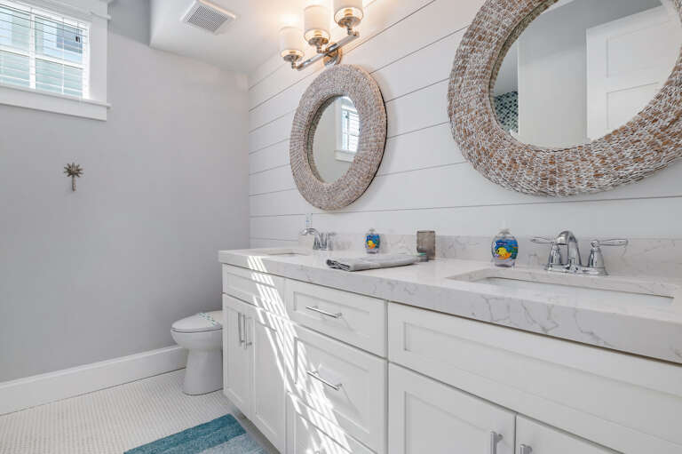 Get ready side by side at the double sinks — no more waiting for the bathroom to open up before the beach.