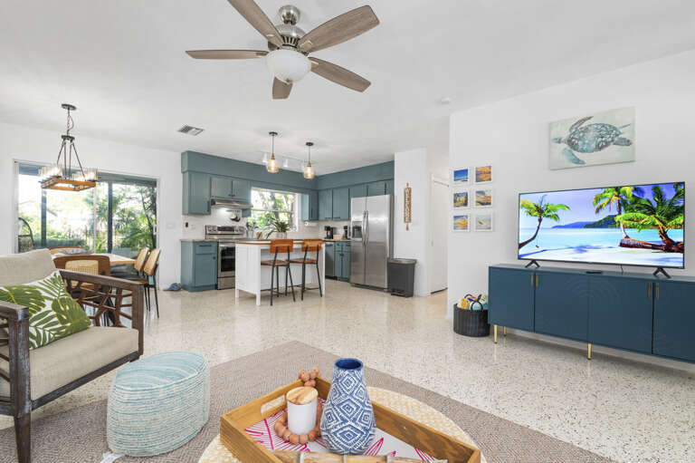 Drop your bags, take it all in — the open layout means the whole group is together whether you're cooking, eating, or just hanging out.