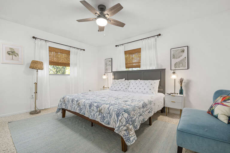 Wake up in the primary suite and take a minute — king bed, smart TV, and enough room to actually unpack for the week.