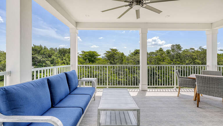 Claim the porch sofa for your own lazy morning coffee before anyone else in the group is even awake.