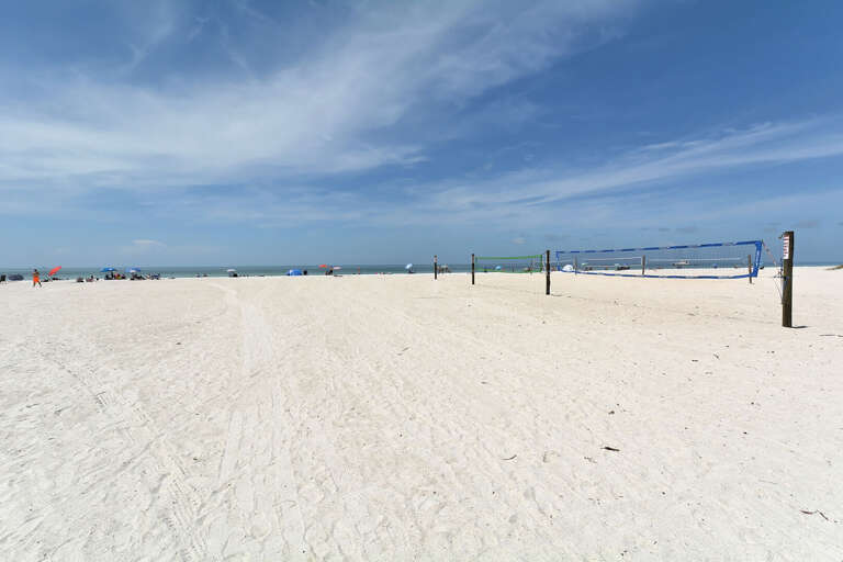 Claim a spot on the wide sand and get your volleyball game going before lunch.