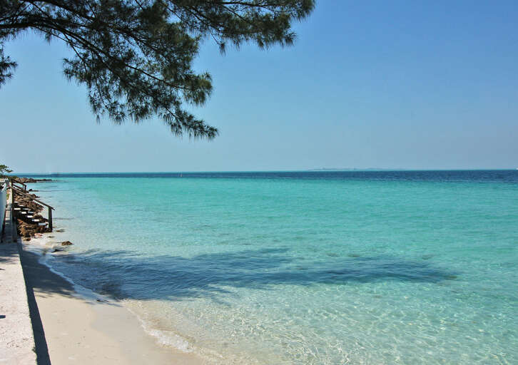 Find your own quiet stretch of shoreline like this one, just past where the crowd usually stops.