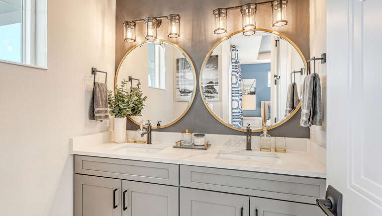 Get ready side by side at the double vanity — no turns, no rushing you.