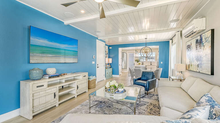 Sink into the sectional with the whole group still in view of the dining table behind you.