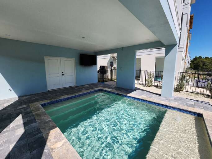Slide into the covered plunge pool for a quick cool-off on your way between errands, no full swim required.