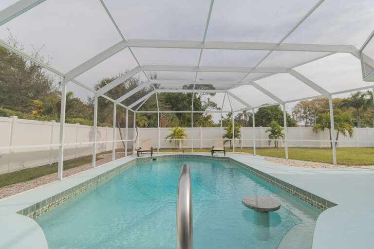 Large pool with built in table and bench for relaxing in the pool