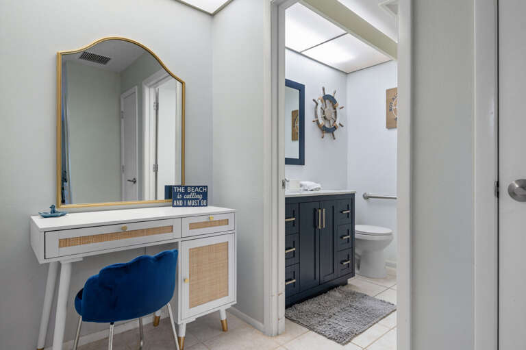Master bedroom with master bathroom, king size bed, large TV, Makeup vanity, Large walk in closet.