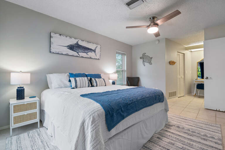 Master bedroom with master bathroom, king size bed, large TV, Makeup vanity, Large walk in closet.