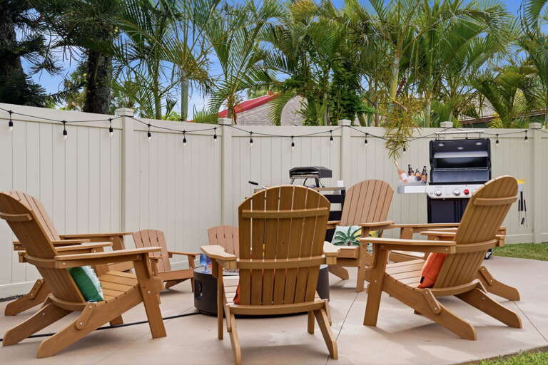 Pull up a chair and claim your spot. The fire pit holds six comfortably — everyone gets an armrest and a view of the flames.