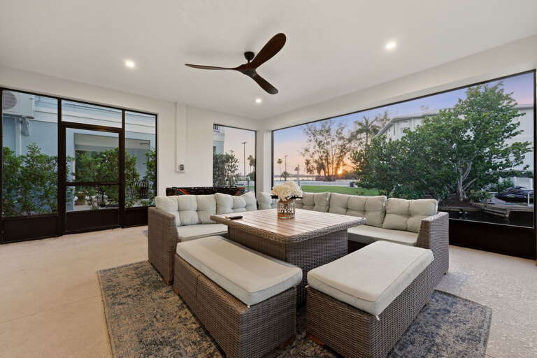 The ground-floor enclosed porch takes on a magical quality at dusk