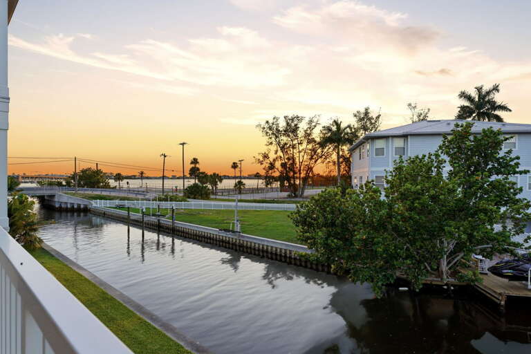 Step onto the balcony and drink in this view - the canal stretches toward the intercoastal