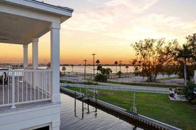 An unobstructed panoramic sunset view from the rear balcony