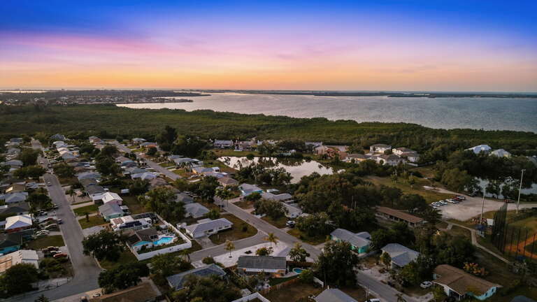 Explore a quiet residential neighborhood with mature trees, just a short drive from everything Anna