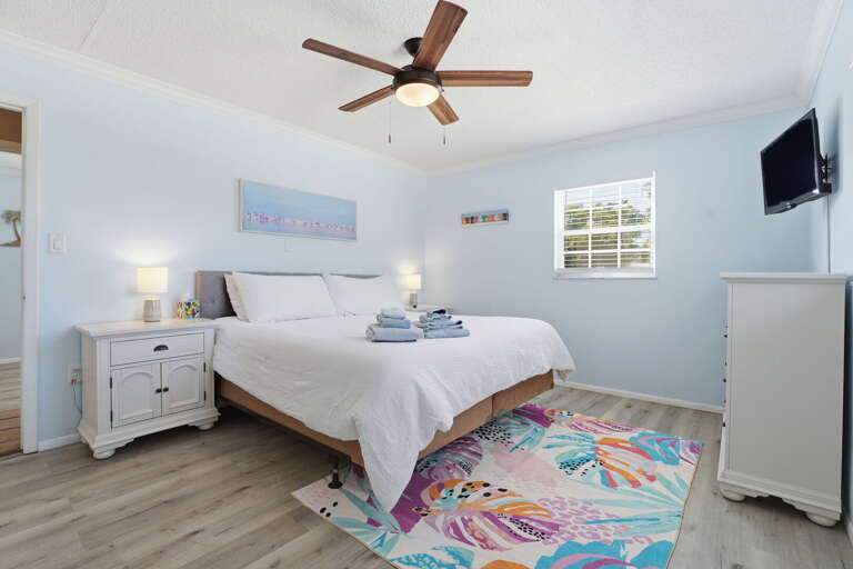 Find the desk tucked in the master when someone needs to work remotely -- queen bed, good light, and your own quiet corner.