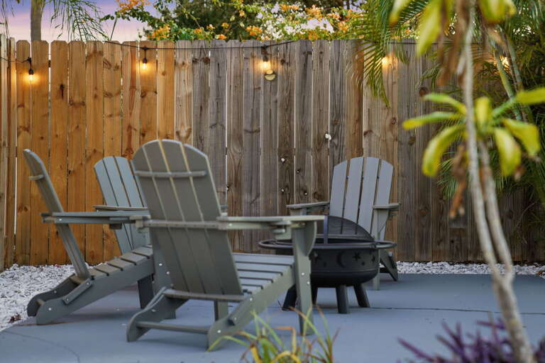 Sit around the fire pit as the string lights come on and the whole crew winds down. This is where the good conversations happen.