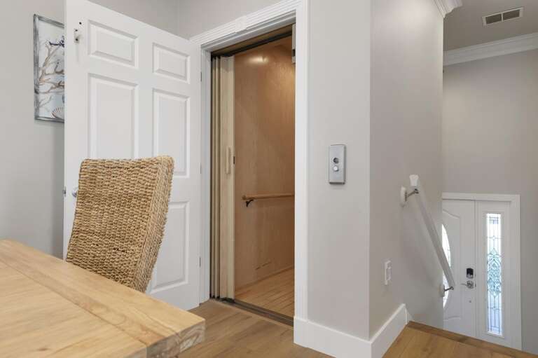 Skip the stairs — your private elevator connects every floor. After a full beach day hauling gear and sandy kids up multiple levels, you'll be glad it's there.
