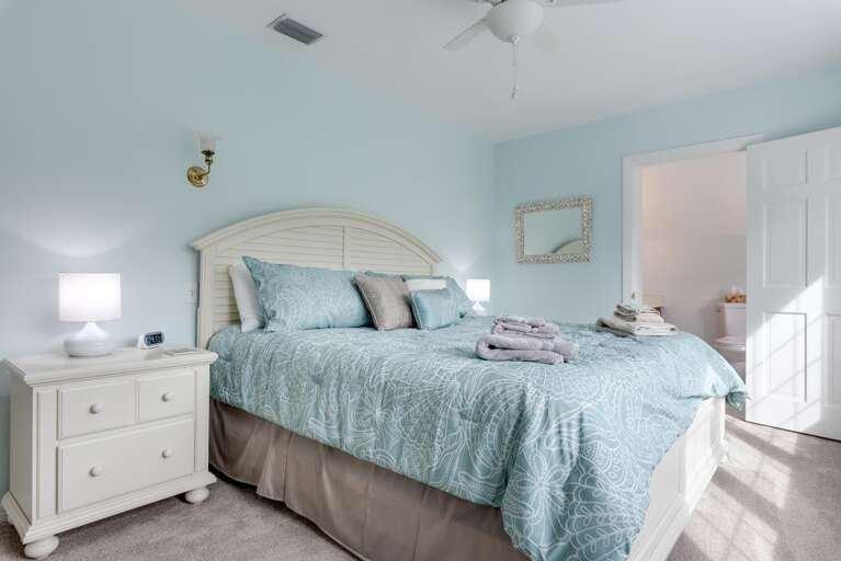 Claim the king suite upstairs and step into your own walk-in closet before you even unpack for the week.