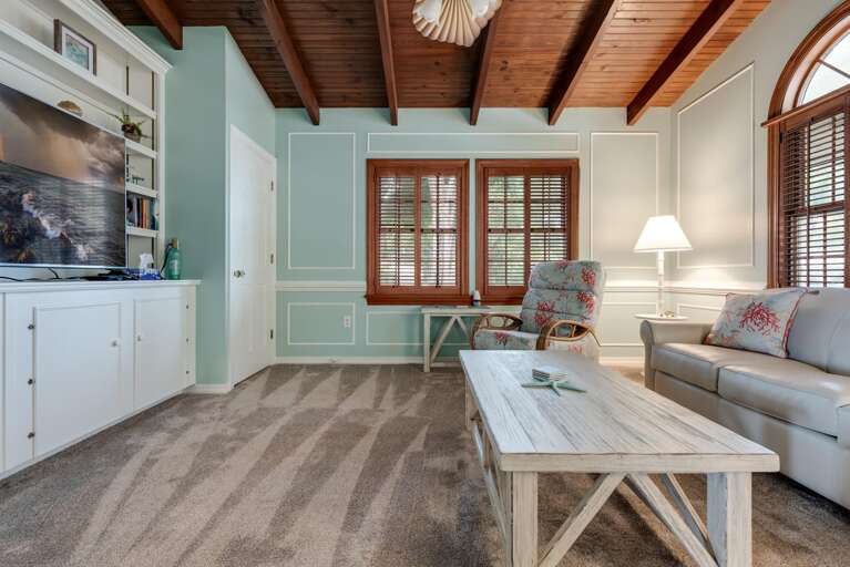 Escape into the TV room when you need a quieter corner — the pull-out couch means it doubles as an extra bedroom whenever you need one.