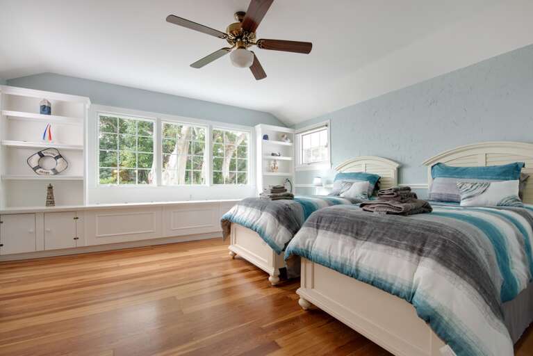 Let the kids pick their own twin and still have the walk-in closet and bay views the grown-ups get downstairs.