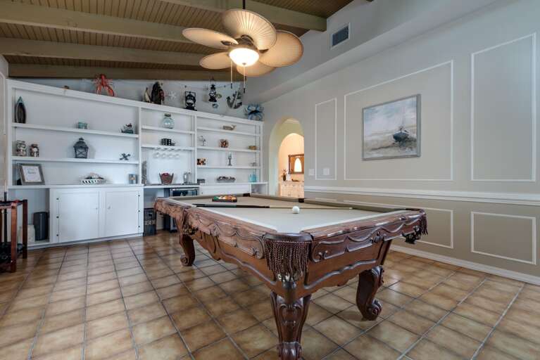 Pick teams for foosball or take over the pool table — this room is where the competitive side of the family comes out.