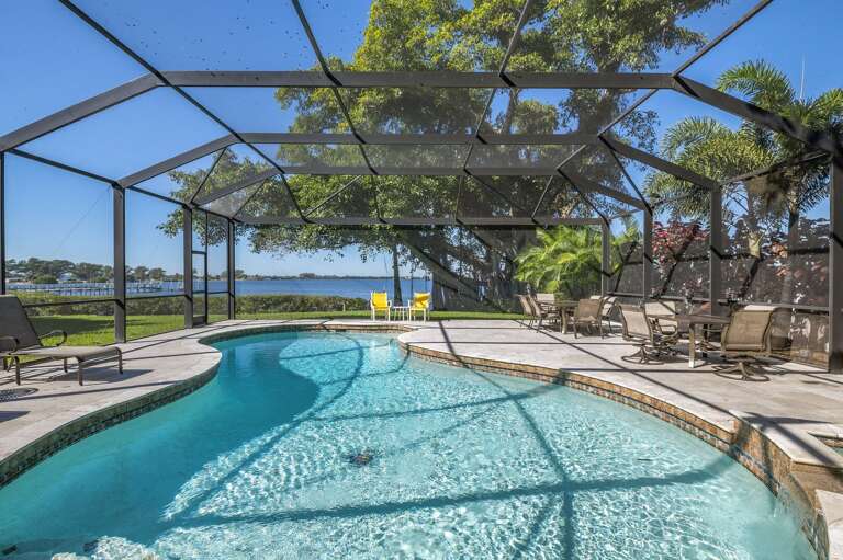 A pool that curves around you and a view that doesn't quit. This is where your afternoon plans disappear.