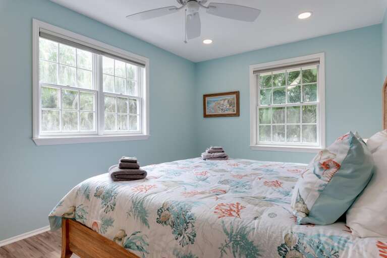 Sleep in your own king bed away from the main house and still wake up thirty seconds from the water.