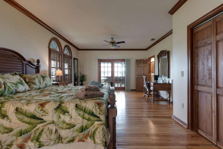 Wake up here first and step straight to the porch doors for your own private look at the bay before anyone else is awake.