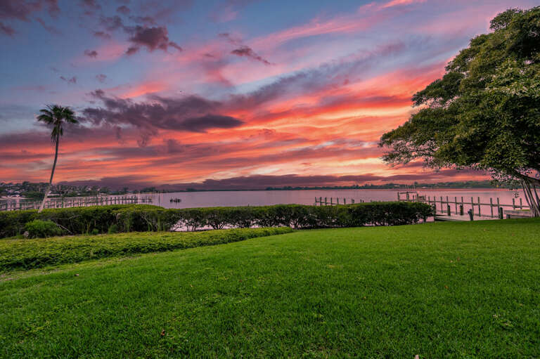 Walk the pier past the mangroves and drop a line right off the dock — bring the kayaks, because 170 feet of private waterfront is calling.