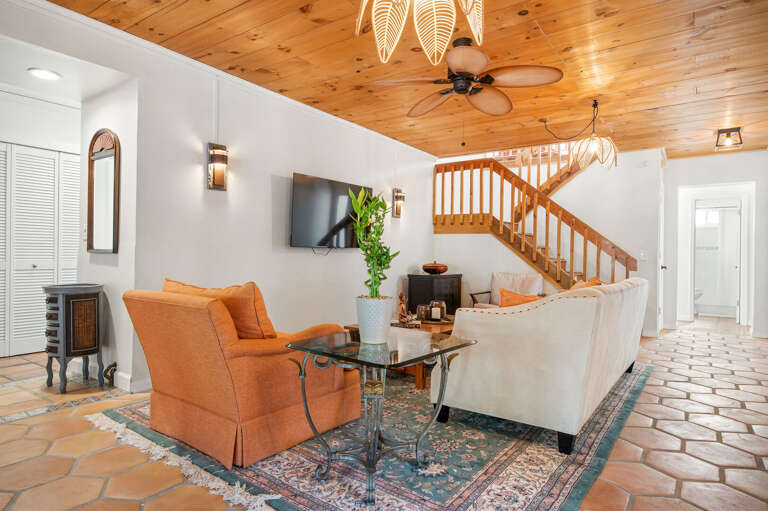 Your base camp between beach days: bright, open, character in every corner, and seating for the whole group without anyone drawing straws.