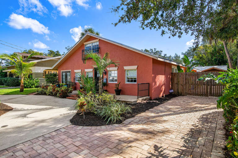 Pull up the brick paver driveway, roll through the side gate to the backyard, and find the house ready and waiting for the whole group.