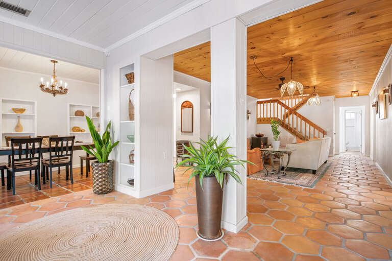 Walk in and the terracotta tile floors and original columns remind you this house has been here long before vacation rentals were a thing. The character is real.