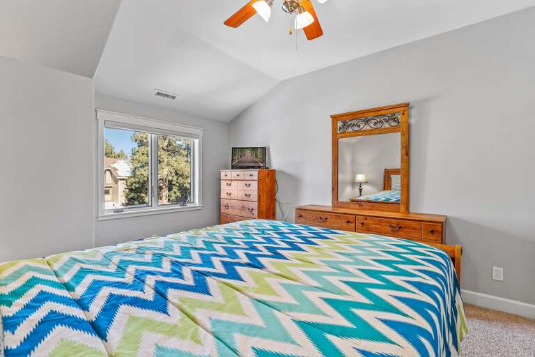 Guest Bedroom 1 - 2nd Floor: Queen bed with a memory foam topper, cable TV, two dressers, and an end table. Guest Bedroom 1 - 2nd Floor: Queen bed with a memory foam topper, cable TV, two dressers, and an end table.