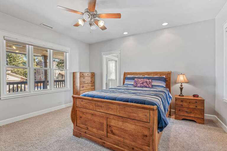 Smaller Master Bedroom - 1st Floor: Queen bed with a memory foam topper, cable TV, and an en-suite bathroom Smaller Master Bedroom - 1st Floor: Queen bed with a memory foam topper, cable TV, and an en-suite bathroom