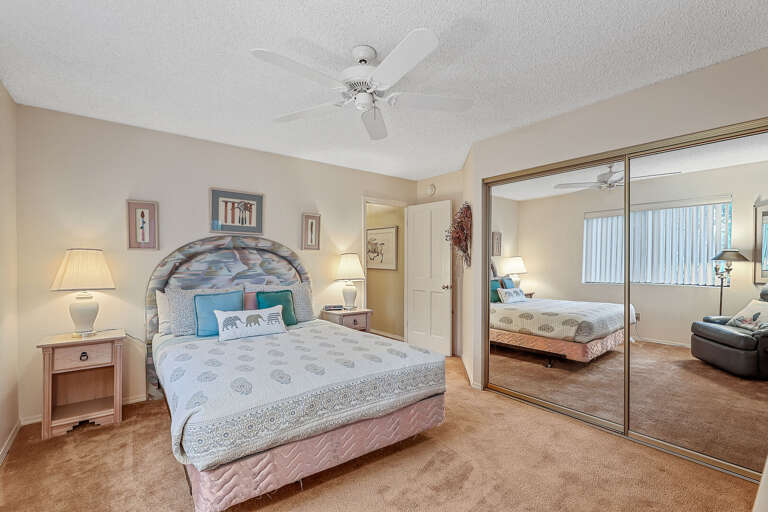 Bedroom 1 - 1st Floor: Features a queen-size bed for a restful night's sleep and access to a shared full bathroom. Bedroom 1 - 1st Floor: Features a queen-size bed for a restful night's sleep and access to a shared full bathroom.