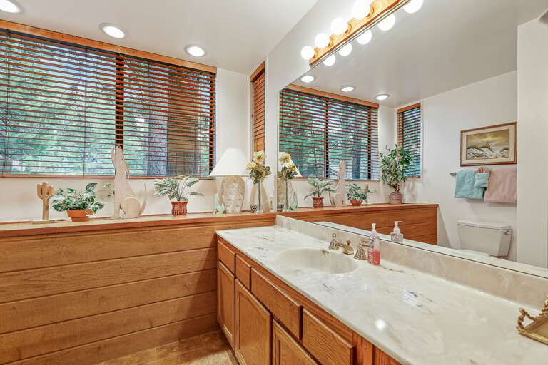 Hall Bathroom - 1st Floor: A full-sized bathroom with a shower/tub for added convenience. Hall Bathroom - 1st Floor: A full-sized bathroom with a shower/tub for added convenience.