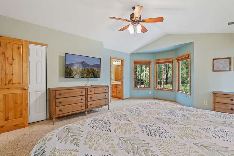 MASTER BEDROOM: King bed and Full-size sleeper sofa accommodating up to 4 guests, large private balcony with seating, Smart TV, and en suite with a jacuzzi tub, dual vanities, and walk-in shower. MASTER BEDROOM: King bed and Full-size sleeper sofa accommodating up to 4 guests, large private balcony with seating, Smart TV, and en suite with a jacuzzi tub, dual vanities, and walk-in shower.