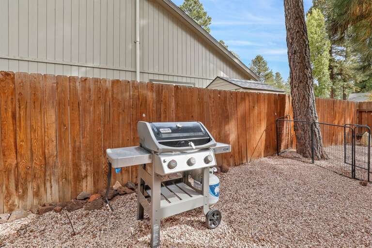 Outdoor grill ready for your next barbecue, perfect for dining al fresco. Outdoor grill ready for your next barbecue, perfect for dining al fresco.