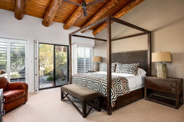 Master bedroom with access to the patio space. Master bedroom with access to the patio space.