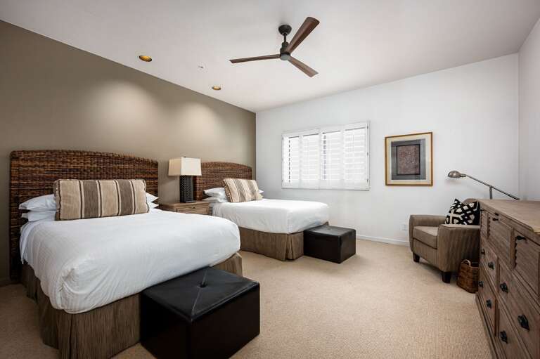 Two Queen beds with a private seating area. Two Queen beds with a private seating area.