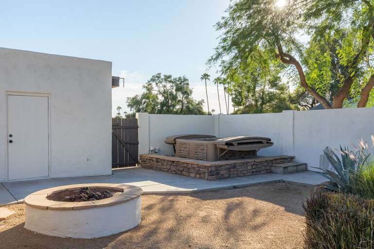 Outdoor Firepit w/ Hot Tub in Background