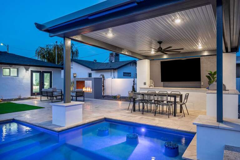 Memorable nights under this pergola with swim up bar stools.