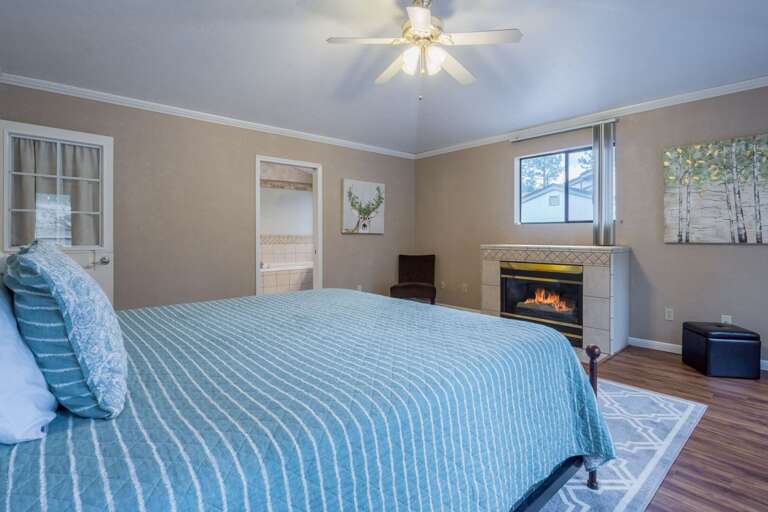 While the decorative fireplace is non-functional, it adds a cozy ambiance to the room.