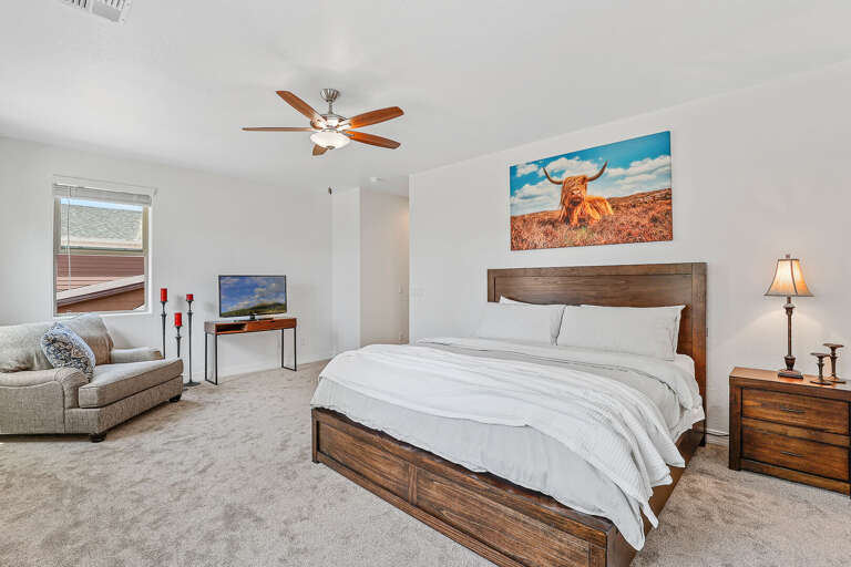 Sleep in comfort and luxury in this spacious king-size bedroom.