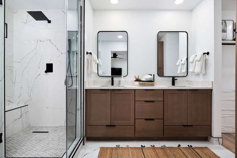 We love this walk in shower with seating. Double vanity sinks. We love this walk in shower with seating. Double vanity sinks.