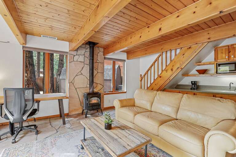 Casita's Living Space: This comfortable retreat features a private entrance from the main house, located to the left of the garage, and is also accessible from the backyard. Casita's Living Space: This comfortable retreat features a private entrance from the main house, located to the left of the garage, and is also accessible from the backyard.