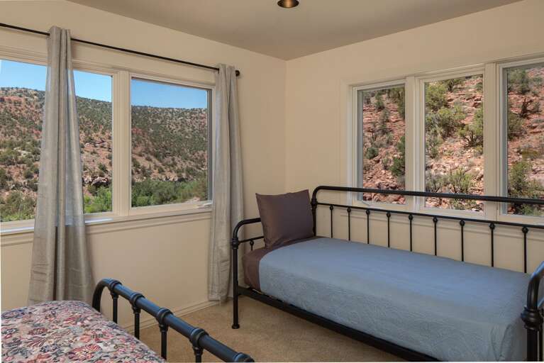 Bedroom 4: Queen bed plus a twin, ideal for a small group or family. Bedroom 4: Queen bed plus a twin, ideal for a small group or family.