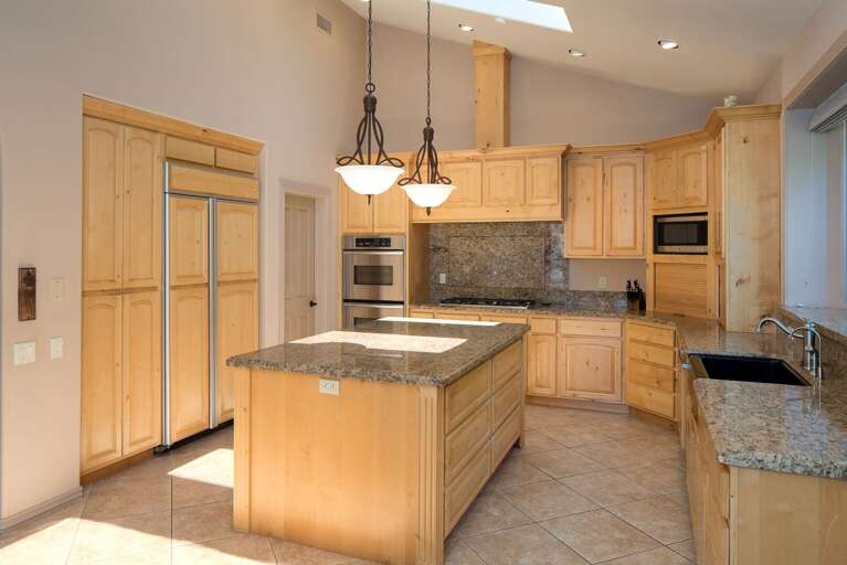 Cook and dine in style with a chef-inspired kitchen and a dining area designed for gatherings. Cook and dine in style with a chef-inspired kitchen and a dining area designed for gatherings.